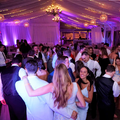 Elegant event space styled with custom decor and accent lighting
