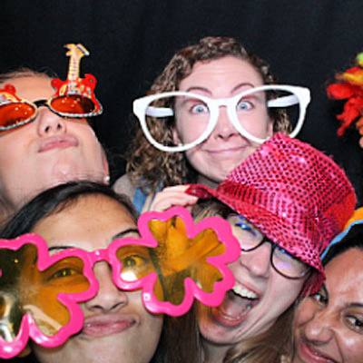 Colorful props and photo booth setup at a private party