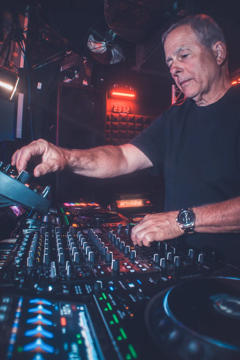 Close-up of Scott Smokin' Silz mixing on Pioneer CDJs in a nightclub